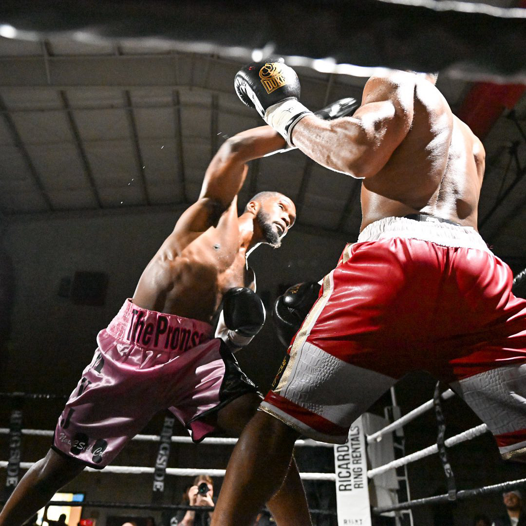 Adonis Wilkins Lands a striking blow during his professional boxing debut