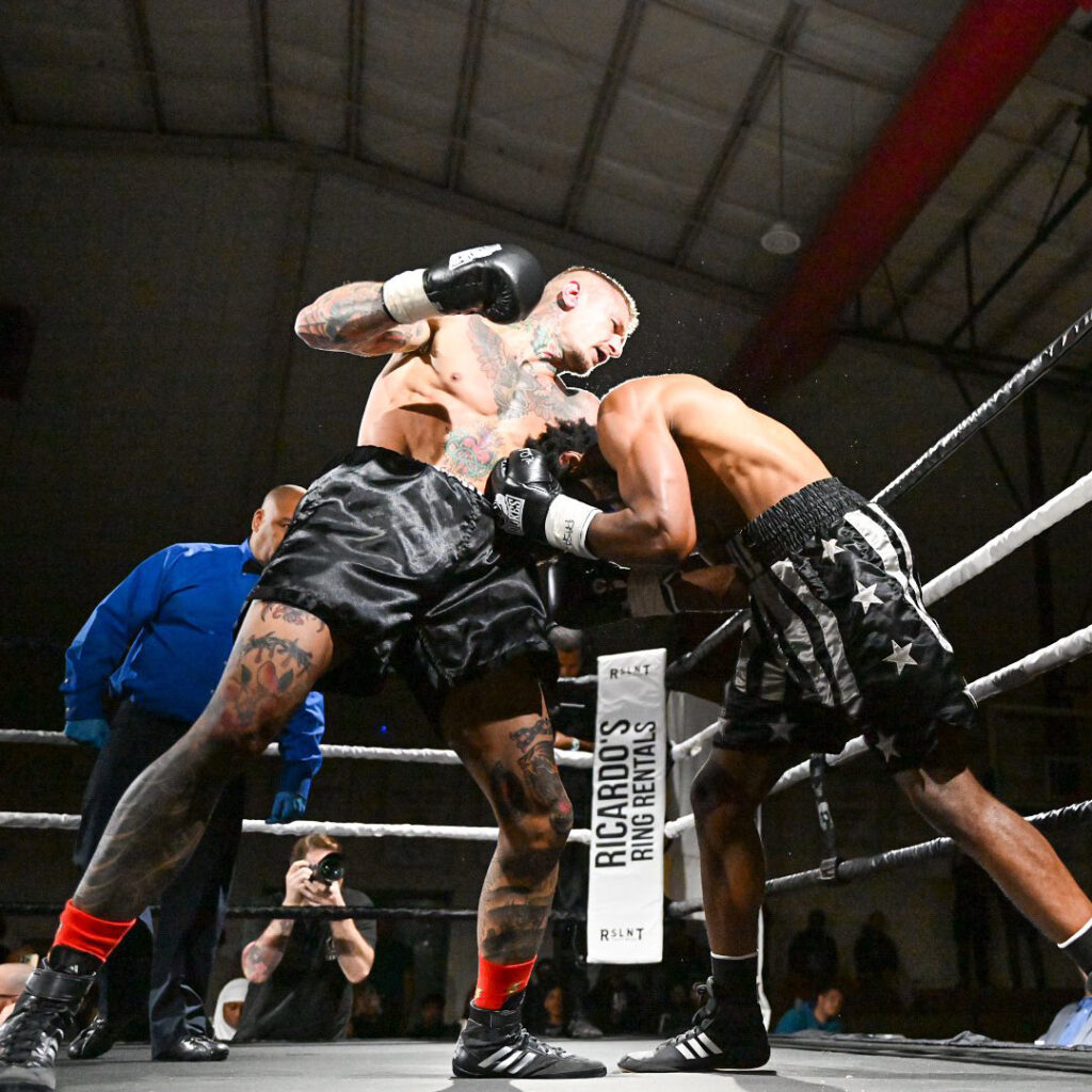 Zak Kelly takes it to Milton Volter during Strict Biz Promotions boxing in Northern Delaware